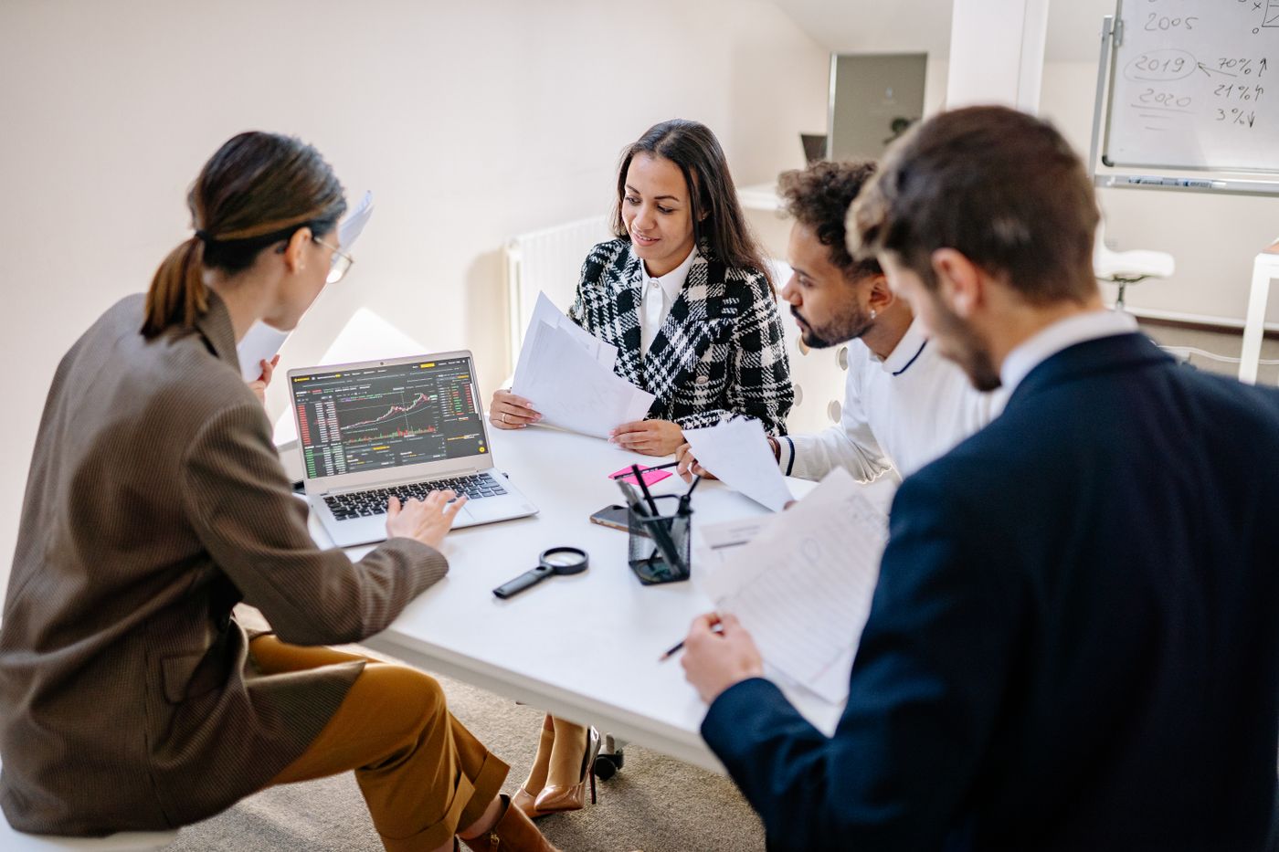 Illustrative stock photograph of a collaborative digital project discussion